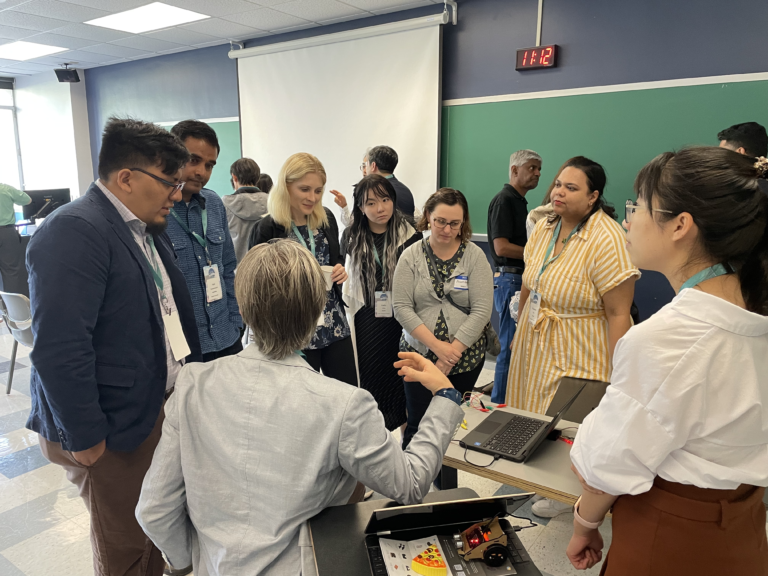 Attendees at the AI Augmented Learning for All: Challenges and Opportunities Workshop