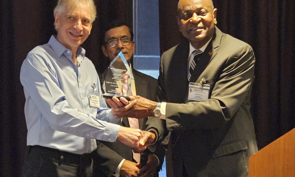 AI4OPT Director Pascal Van Hentenryck received the "Outstanding Presentation on AI" award at the HBCU Engineering and Business Deans National Seminar for his discussion on AI's impact across various fields.